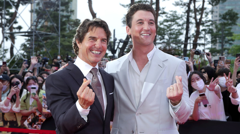 Tom Cruise with Miles Teller