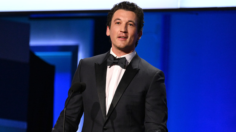 Miles Teller speaking on stage