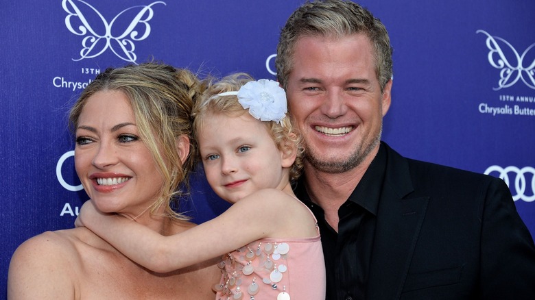 Eric Dane and Rebecca Gayheart holding their daughter Billie