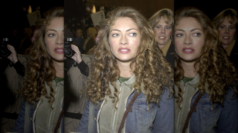 Rebecca Gayheart looking off to the side