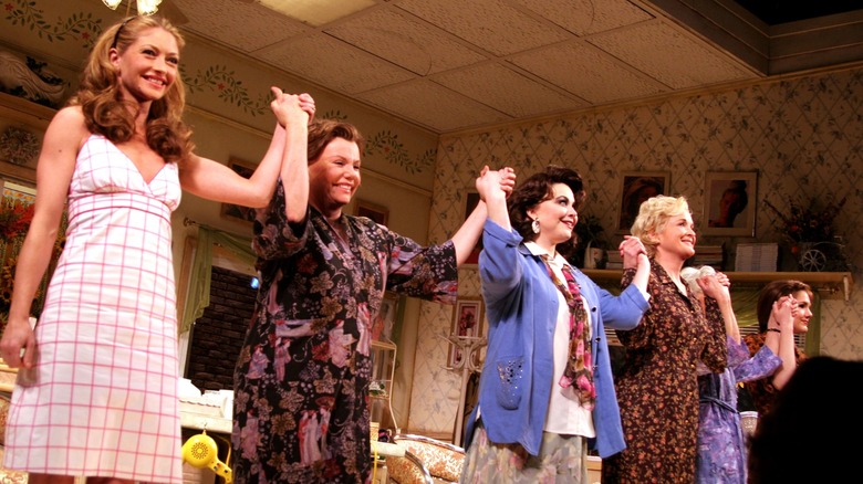 Rebecca Gayheart taking a bow with cast onstage