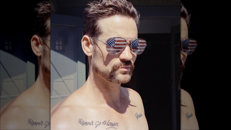 Shane West wearing American flag sunglasses