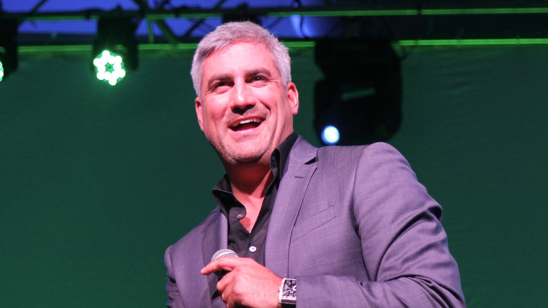 Taylor Hicks smiling in gray 