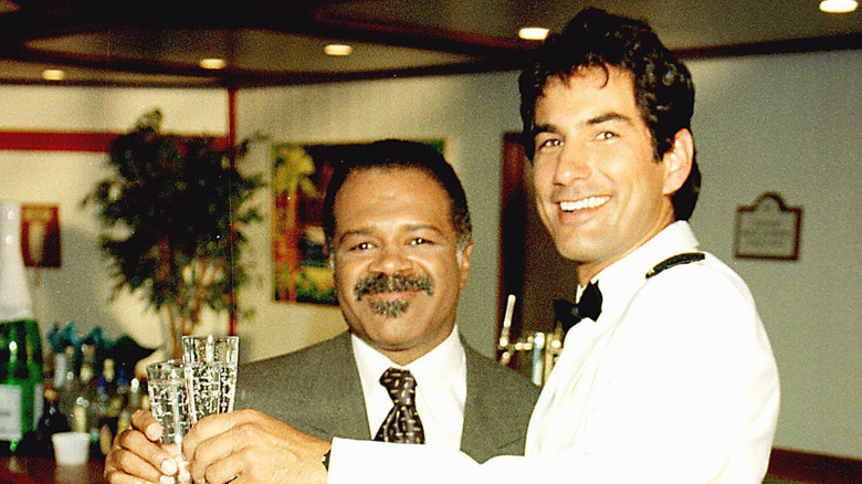 Ted Lange smiling with new bartender Randy Vasquez