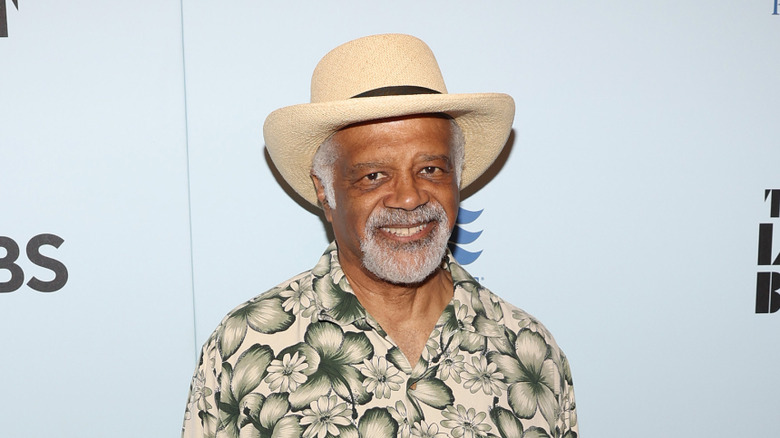 Ted Lange wearing a large hat