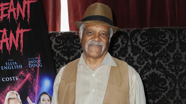 Ted Lange smiling at the premiere of Blood Pageant Contestant