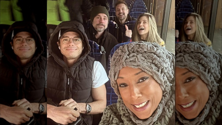 Trina McGee posing in a vehicle with her Boy Meets World co-stars