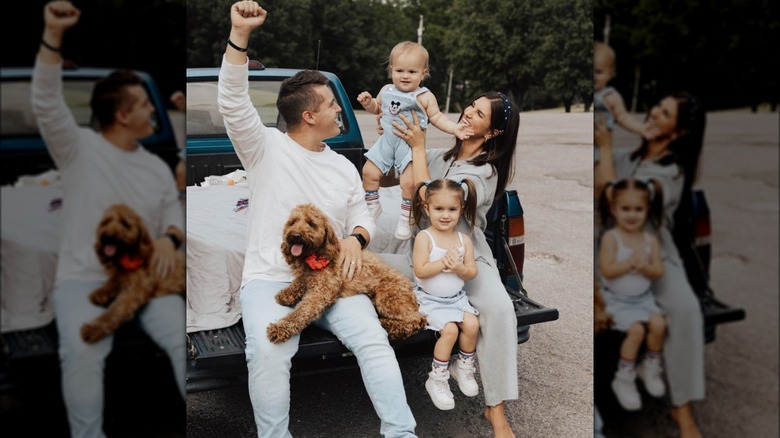 Carlin and Evan Stewart with their kids and dog