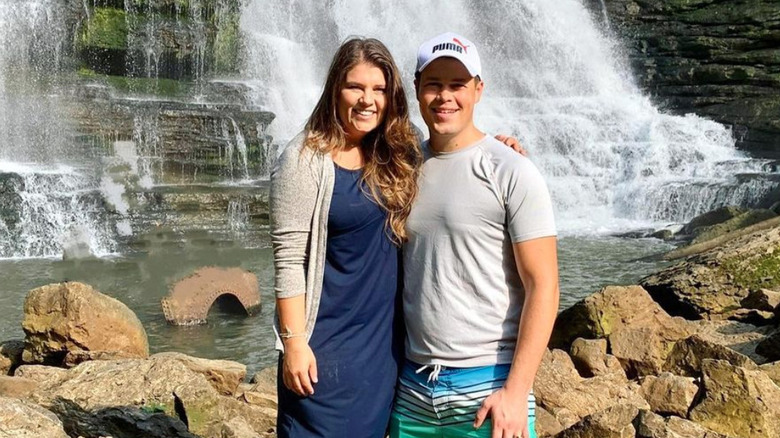 Michael and Brandon Keilen in front of a waterfall