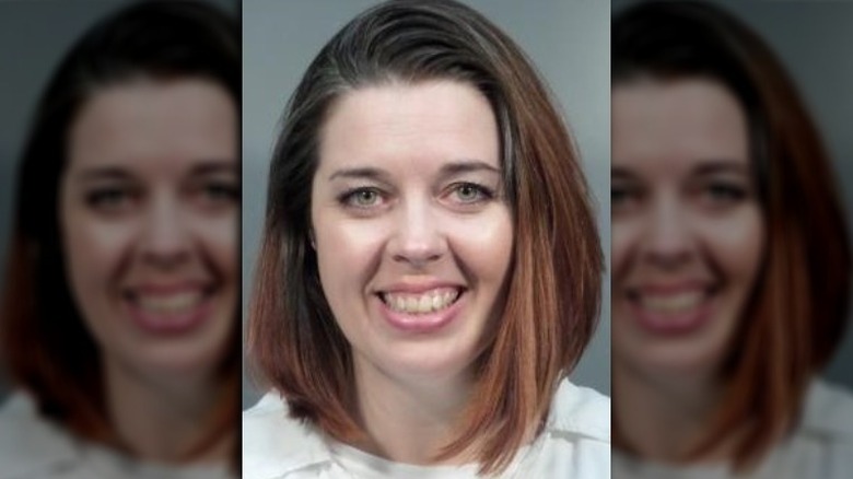 Andrea Clevenger smiling in mug shot