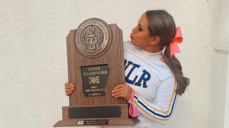 Olivia Stuckey with award