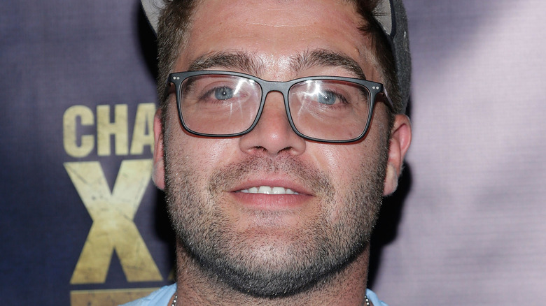 Chris "C.T." Tamburello wearing glasses