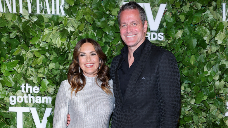 Mariska Hargitay and Peter Hermann smiling at the Gotham TV Awards