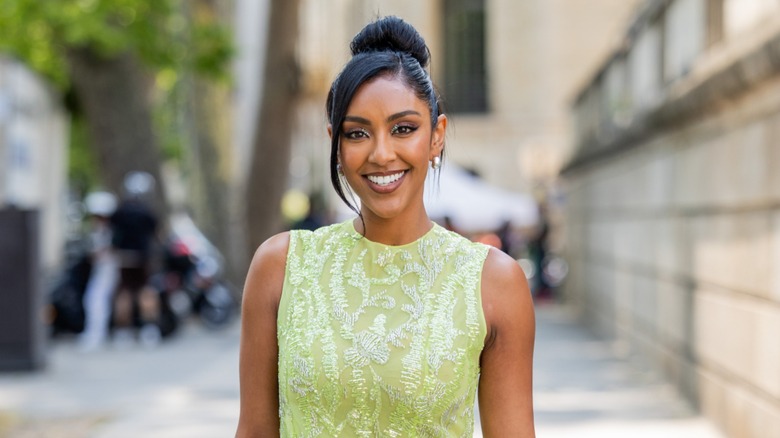 Tayshia Adams in green dress