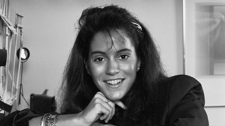 Jami Gertz in black and white