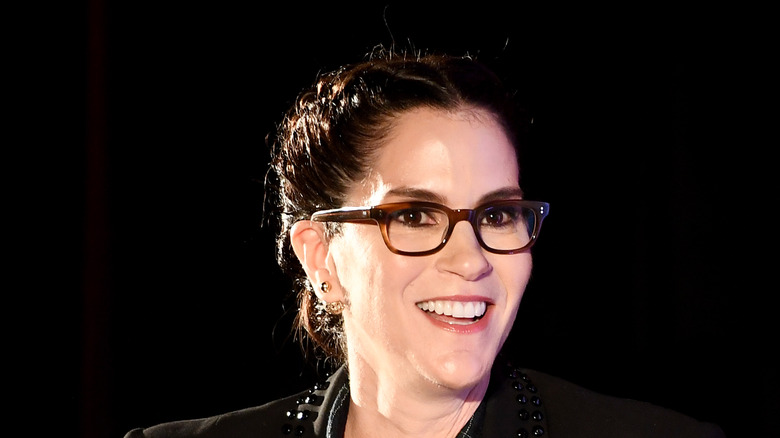 Jami Gertz at an event on stage