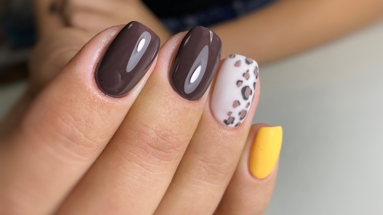 What Do Black Dots On Your Nails Mean