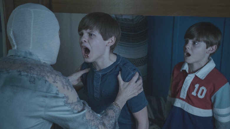 Mother and boys arguing in Goodnight Mommy