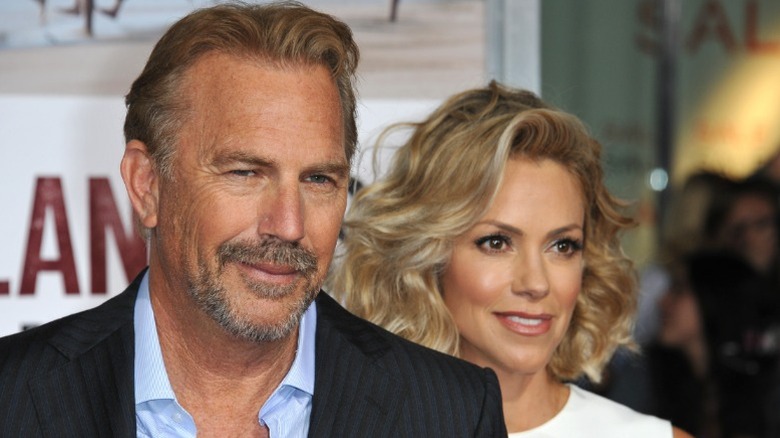 Kevin Costner with Christine Baumgartner before their divorce