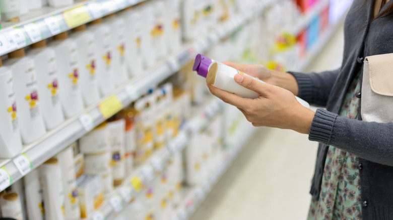 Woman shopping for haircare 