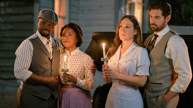 Joseph and Minnie Canfield standing with Elizabeth Thatcher and Lucas Bouchard