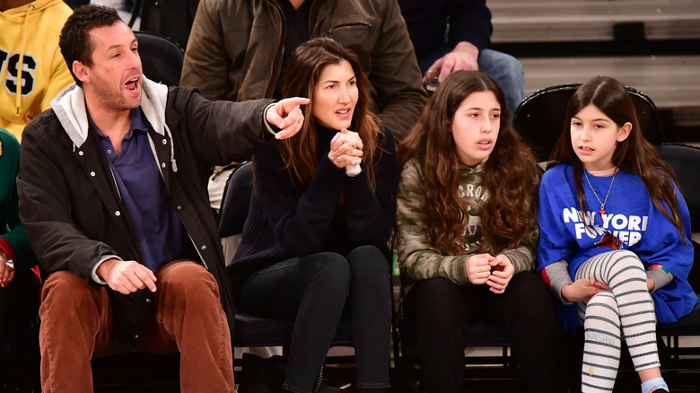 Adam, Jackie, Sadie, and Sunny at basketball game