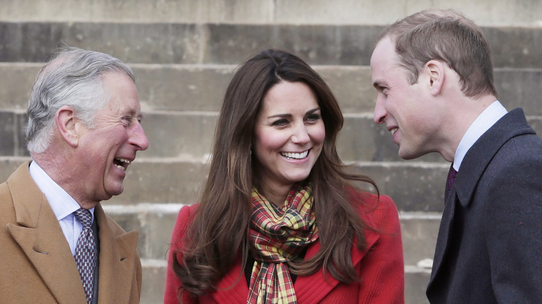 Prince Charles, Prince William, and Kate Middleton posing