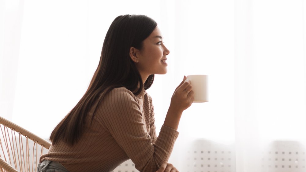 woman drinking coffee