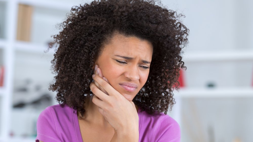 woman with jaw pain