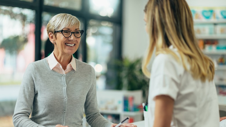 a woman chats with a healthcare professional