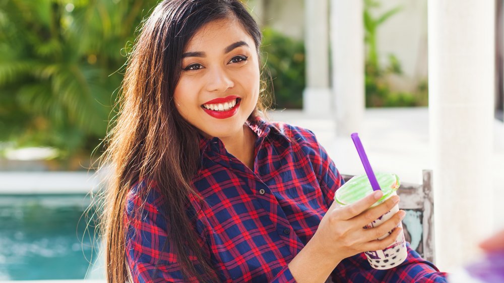 woman drinking bubble tea