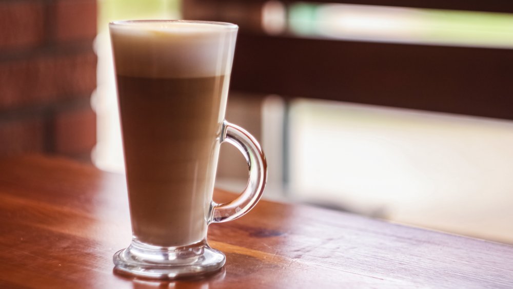 A large cup of coffee on a table