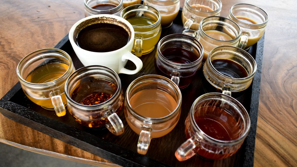 cups of tea and coffee on a tray