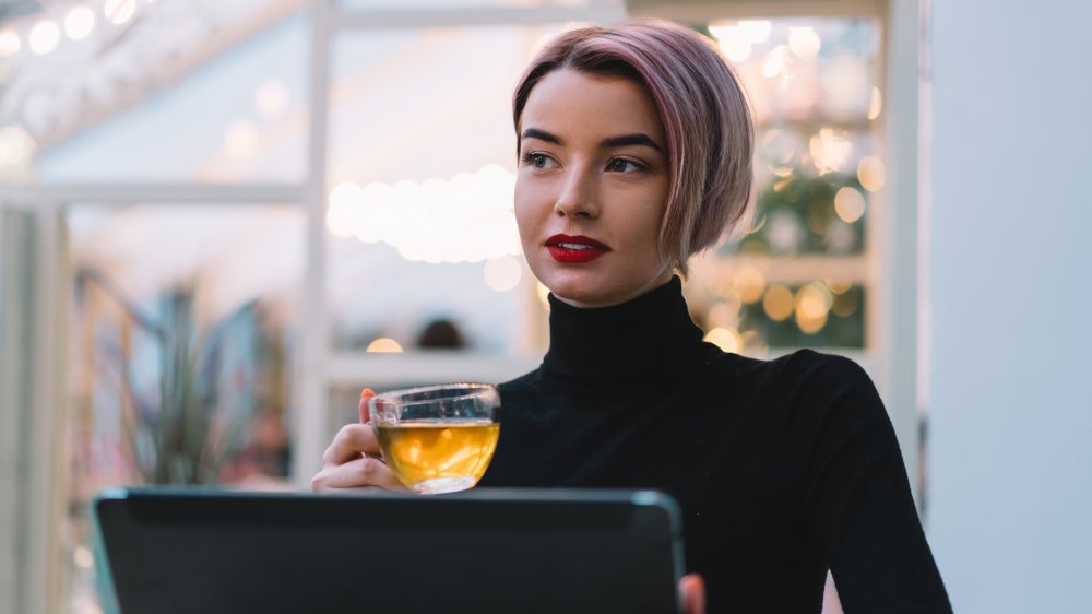 woman drinking green tea