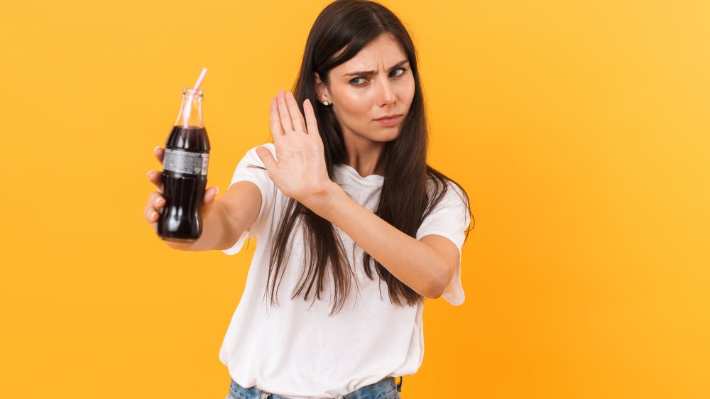 Woman saying no to soda