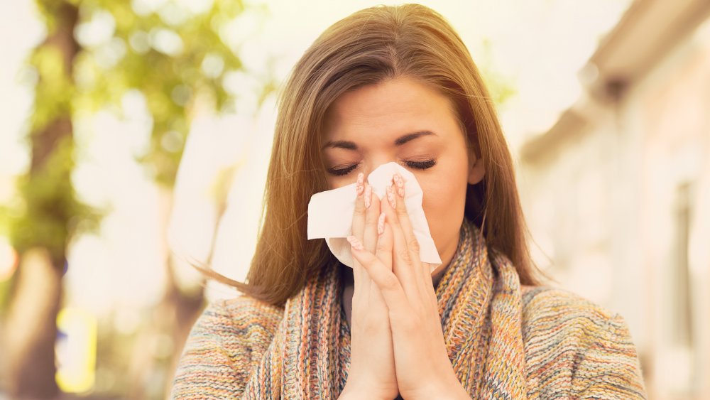 a woman with congested sinuses