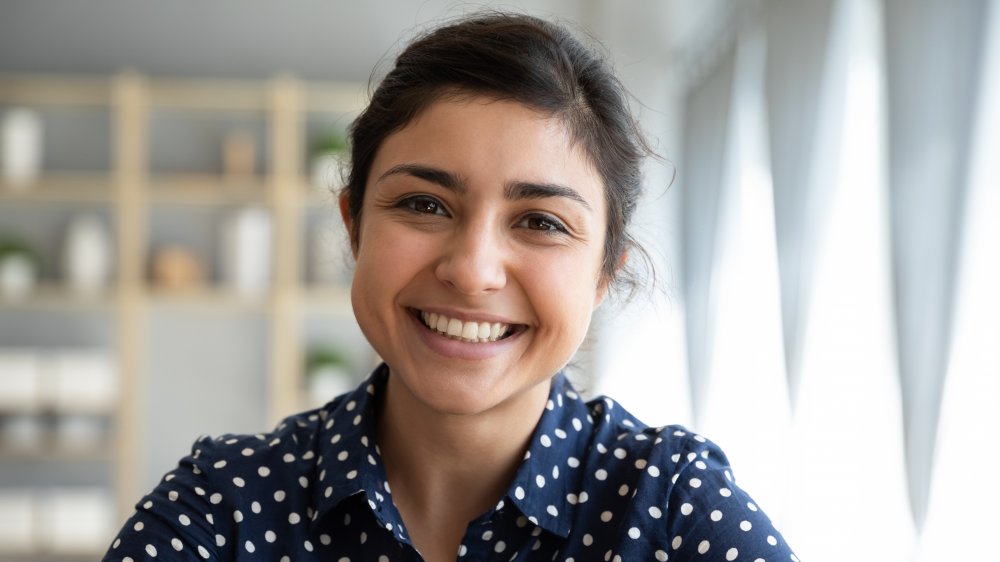 a woman smiling