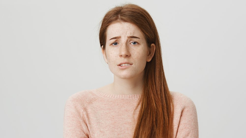 woman worried after drinking rum