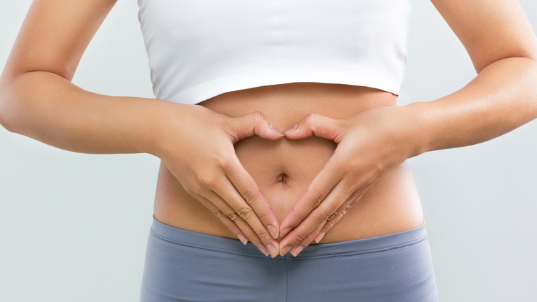 a woman's stomach, showing digestion