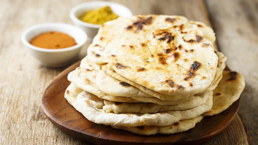 Indian naan with spices in the background