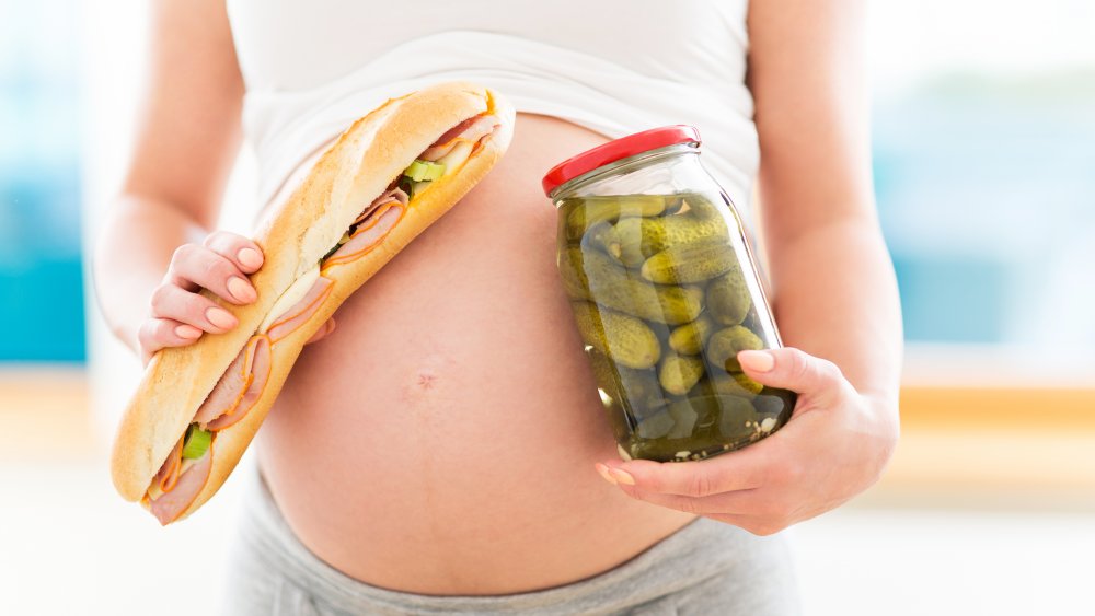 pregnant woman deli meat sandwich and pickles