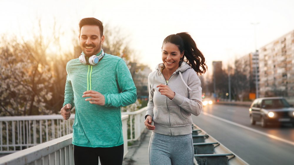 Man and woman exercising together