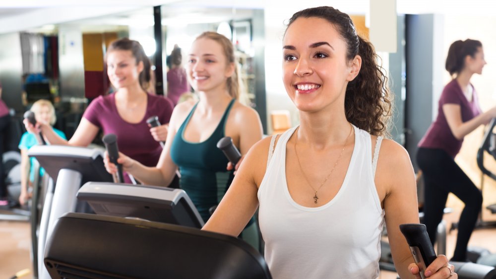 A group of women on elliptical machines