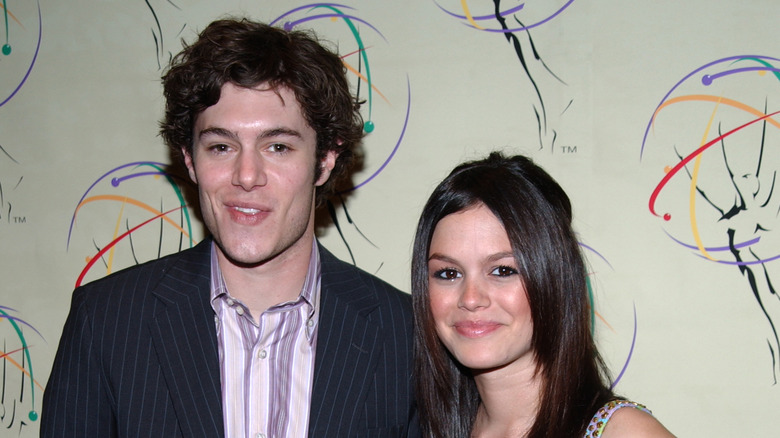 Adam Brody and Rachel Bilson smiling.