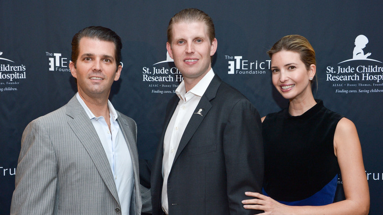 Donald Trump, Jr., Eric Trump, and Ivanka Trump posing