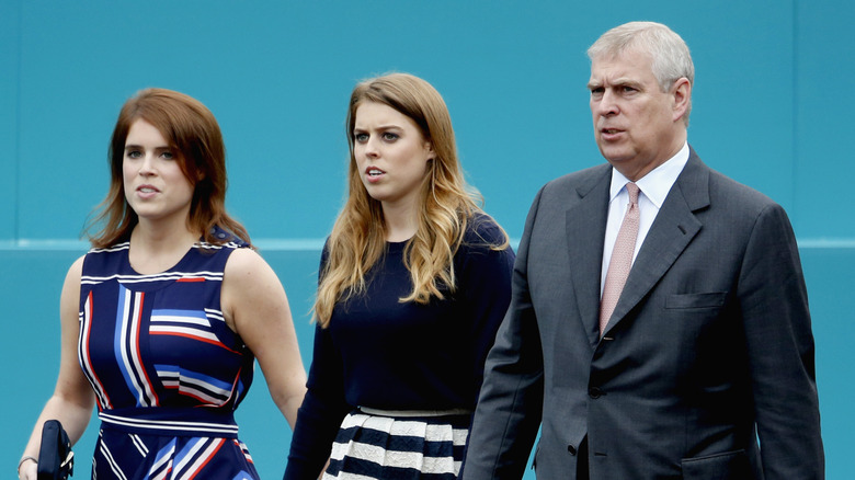 Princess Beatrice, Princess Eugenie, and Prince Andrew at the Queen's 90th Birthday Celebration in 2016.