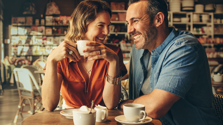 happy couple coffee date talking