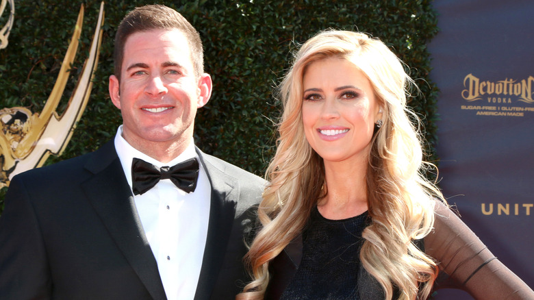 Tarek El Moussa and Christina Haack smiling in formal wear