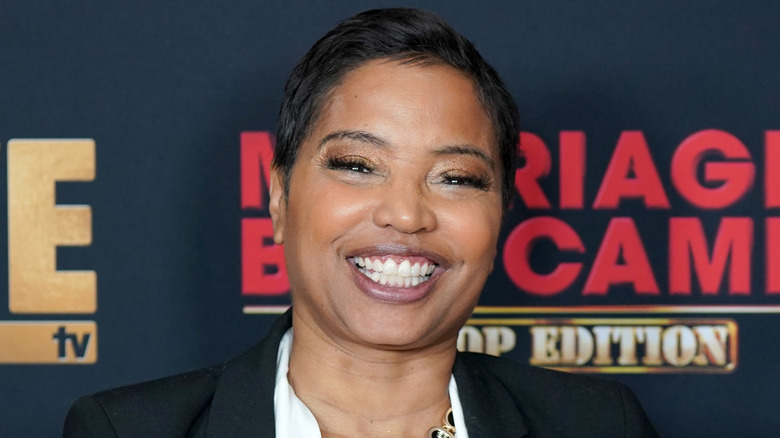 Lynn Toler smiling at event 