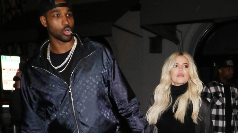 Tristan Thompson and Khloé Kardashian walking